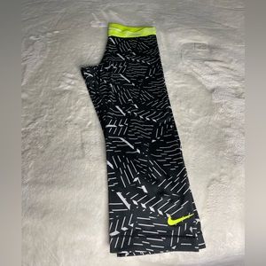 Black and bright, yellow Nike leggings